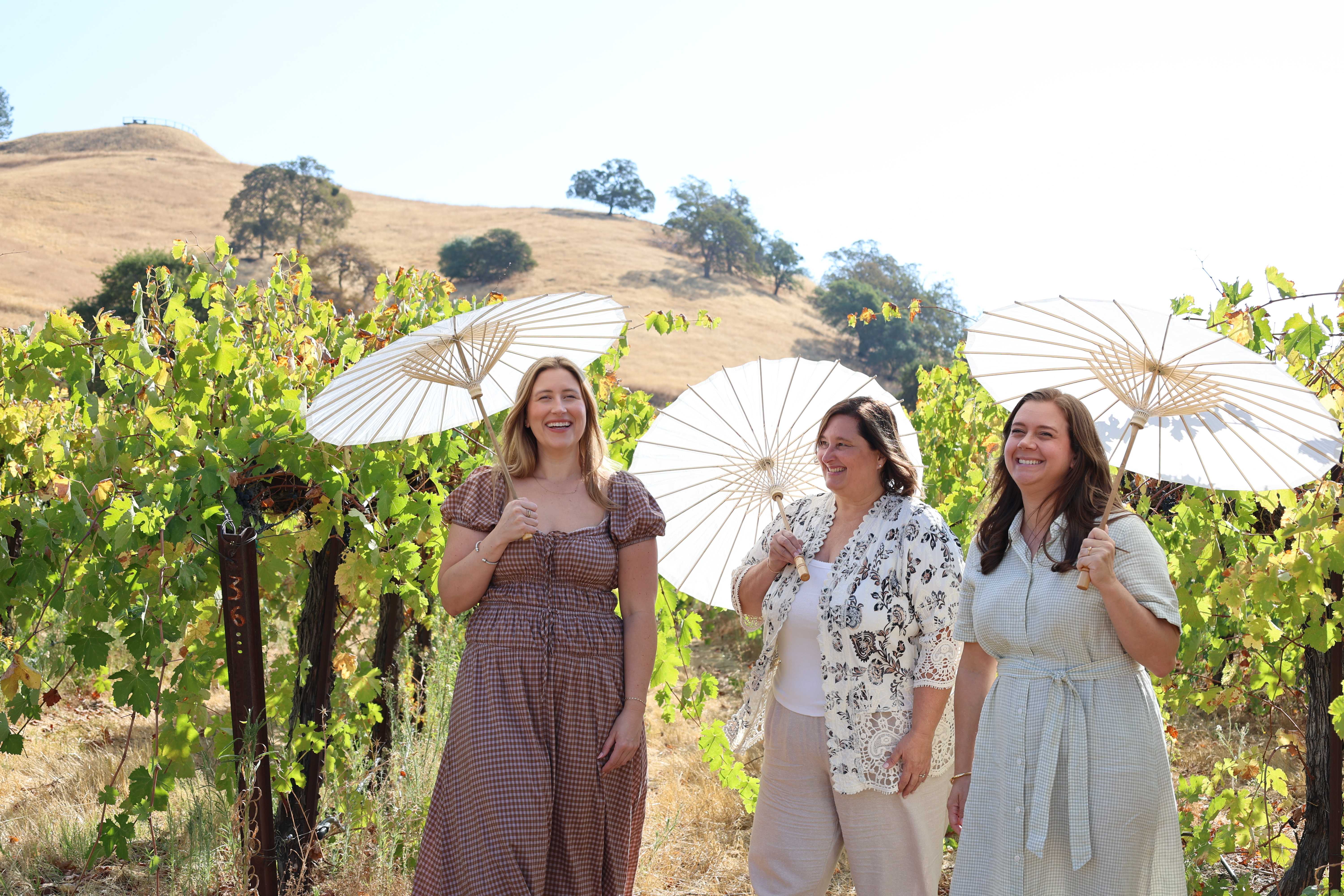 Alicia, Karolyn, and Monica in the vineyard